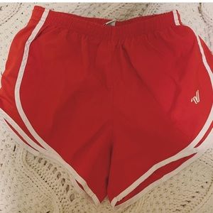Red varsity athletic shorts
